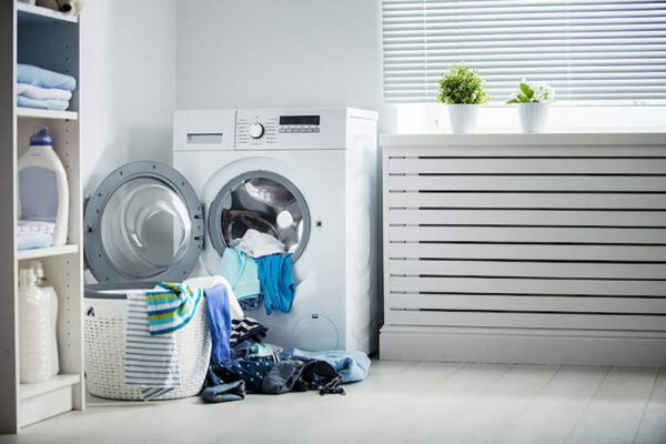 تمیز نشستن لباس‌ها با ماشین لباسشویی